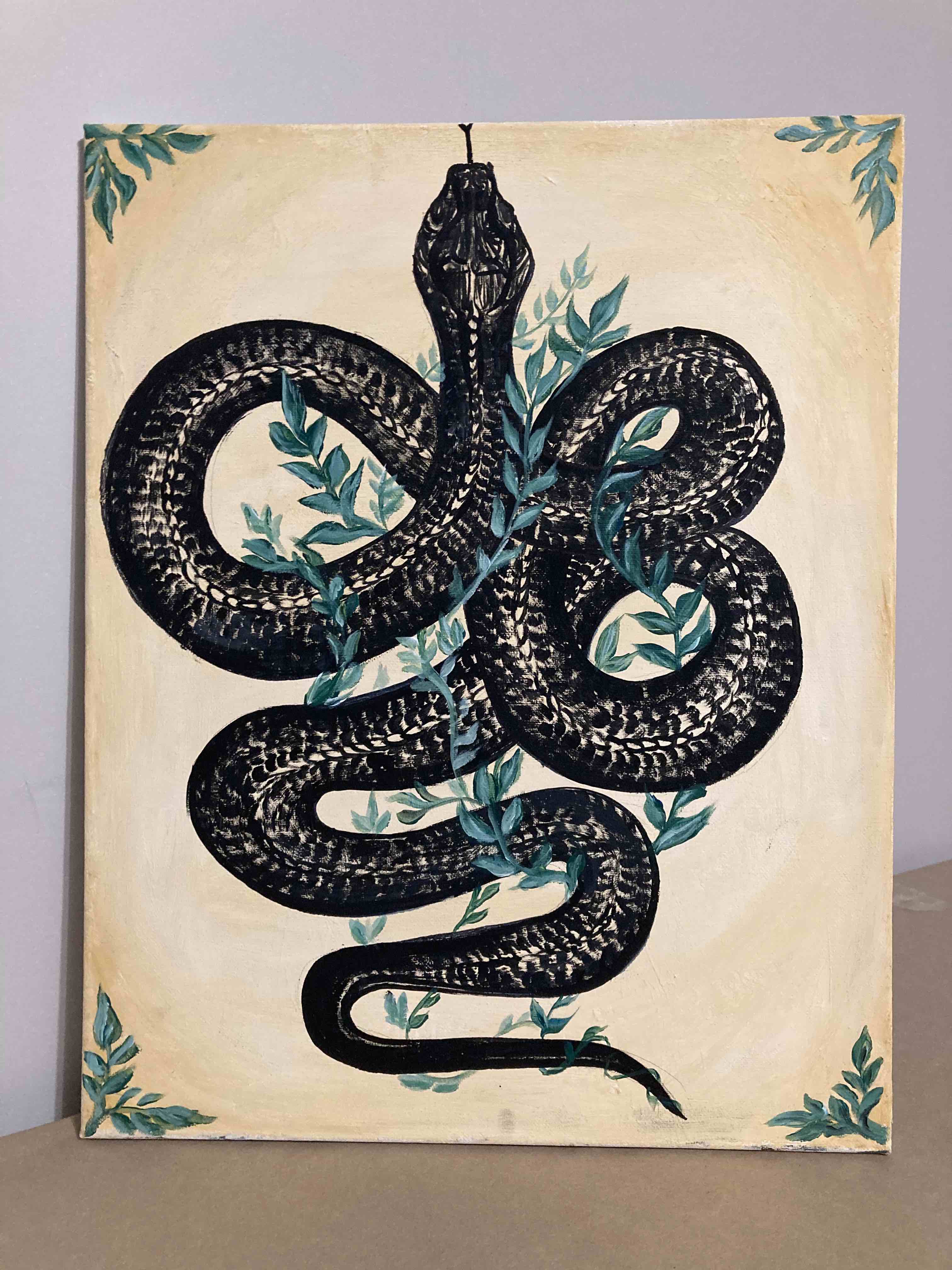 Snakes and Letters | Acrylic paint on canvas (20” X 15”). Black snakes, beautiful vines and yellow paint. This snake is perfect for that urban jungle vibe. The curves add a nice movement to the corners of rooms and walls.