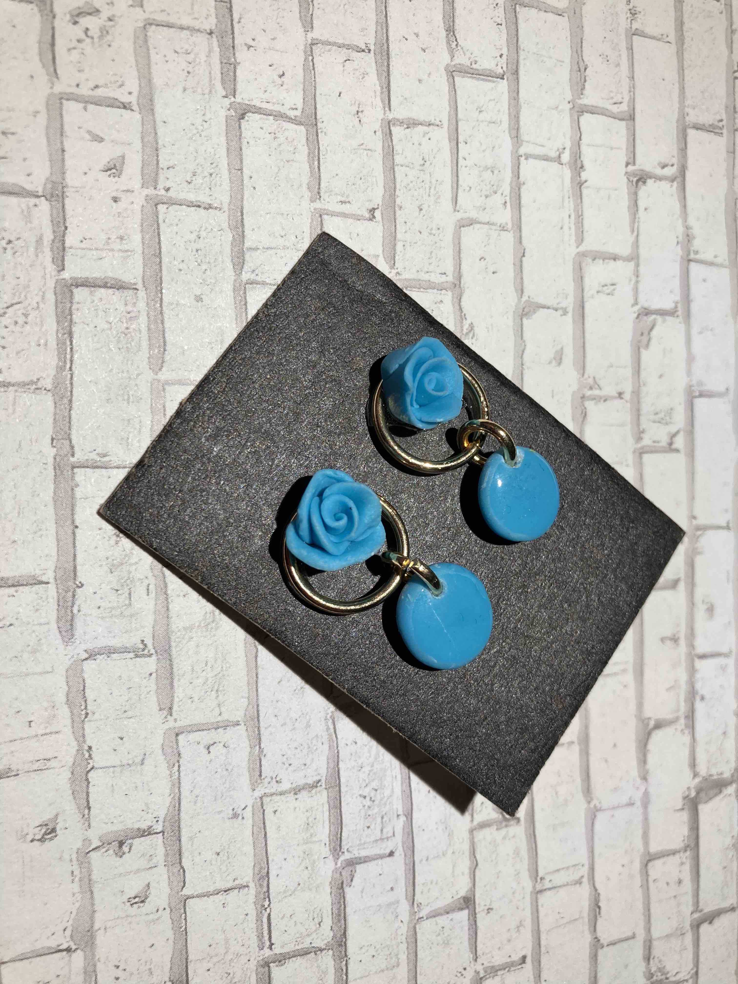 Lovely Baby Blue Roses with Gold Hoops | Baby blue polymer roses with gold posts, resin coating and gold hoops. Nickel free brass.