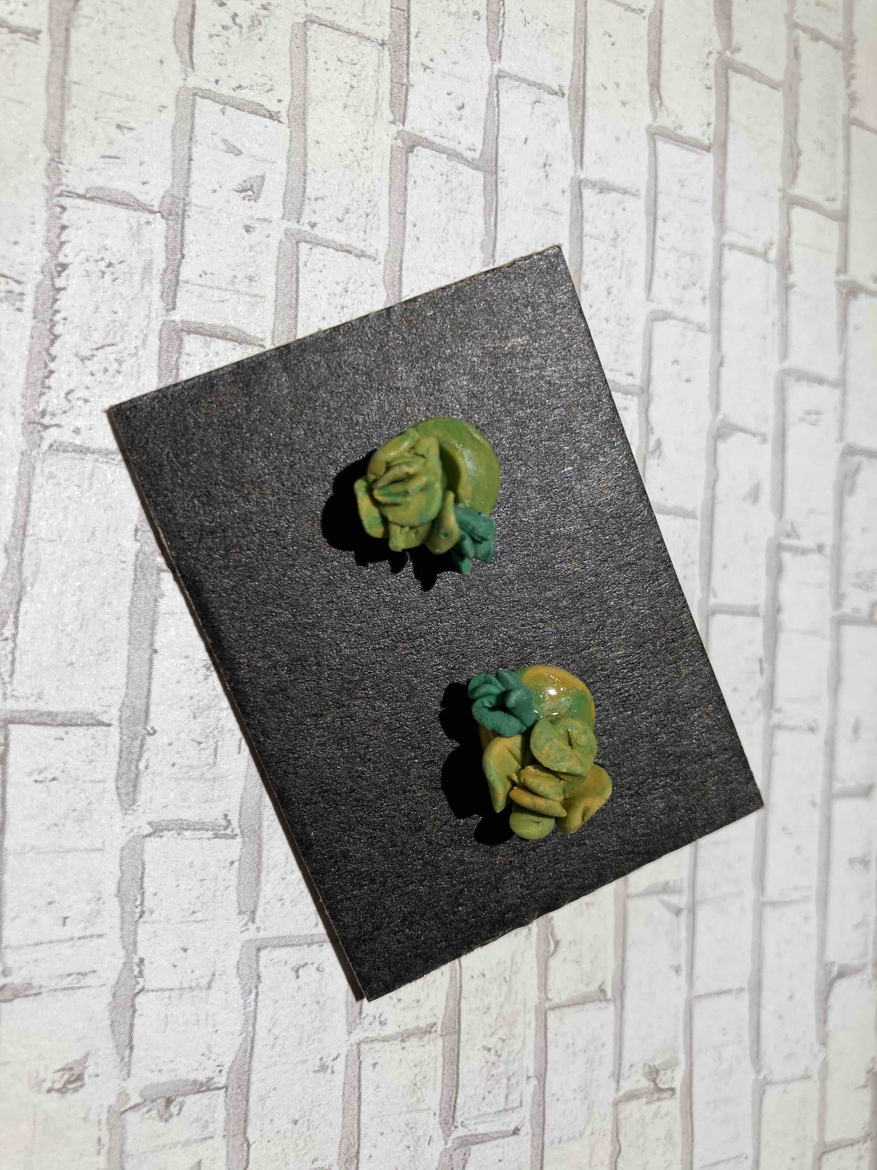 Green Button Stud Garden | Marble green polymer button studs with gold posts, resin coating and a succulent garden. Nickel free brass.
