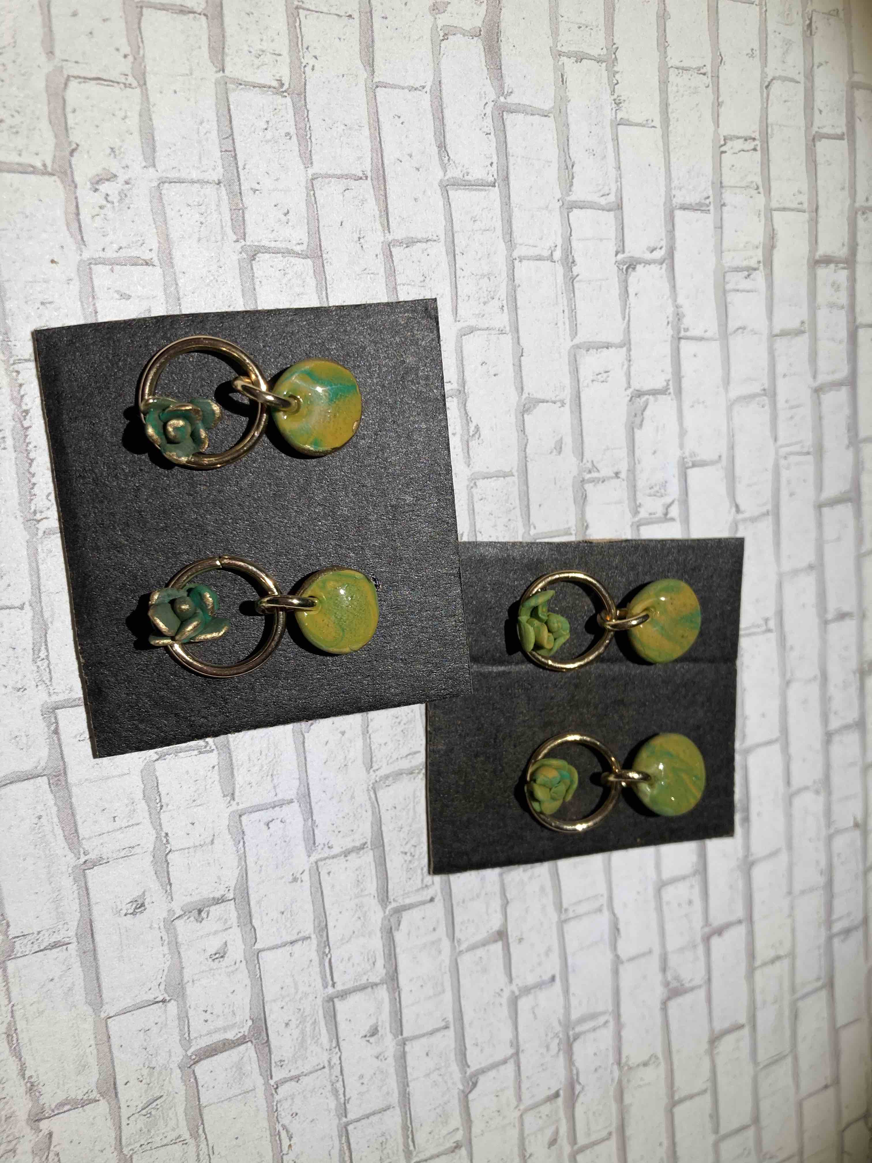   Light Green Succulent Garden with Gold Hoops | Light Marbled green and yellow succulents with gold posts, resin flood and gold hoops. Nickel free brass.
